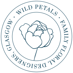 Logo for 'Wild Petals', a florist based in Glasgow. The design features a minimalistic outline of a flower in the centre, enclosed by a circular border with the business name and location written around it in uppercase letters.